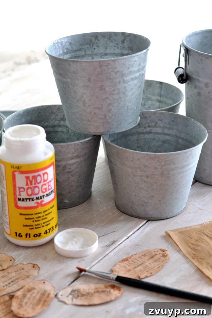 Distressed Rust Pot Makeover 4 Plain galvanized zinc pots ready for a DIY project