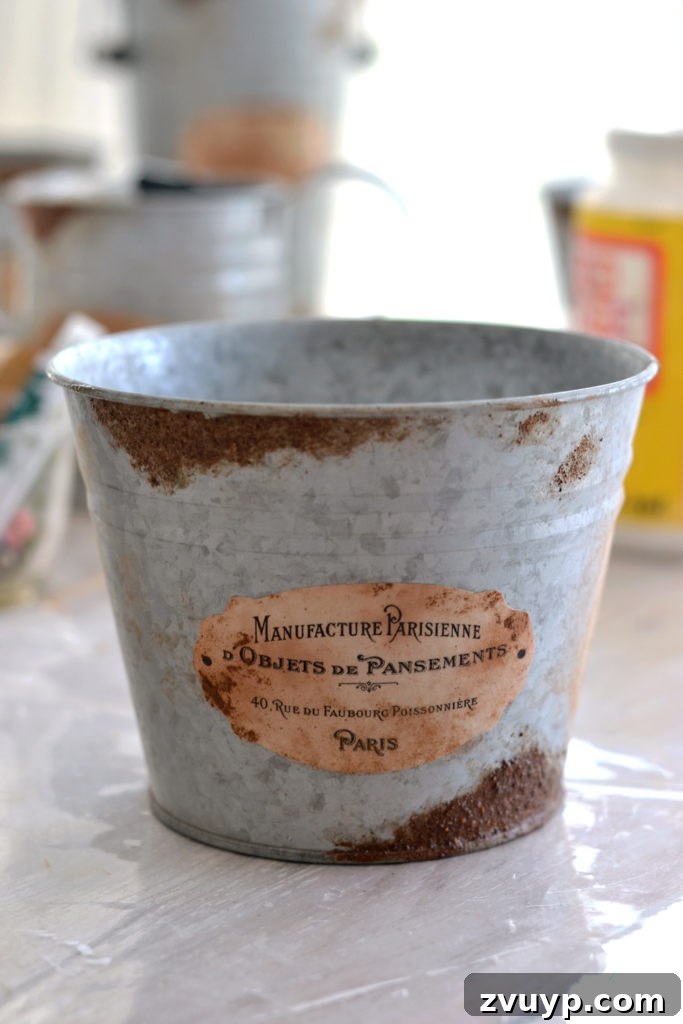 Distressed Rust Pot Makeover 10 Dried faux cinnamon rust on a galvanized pot