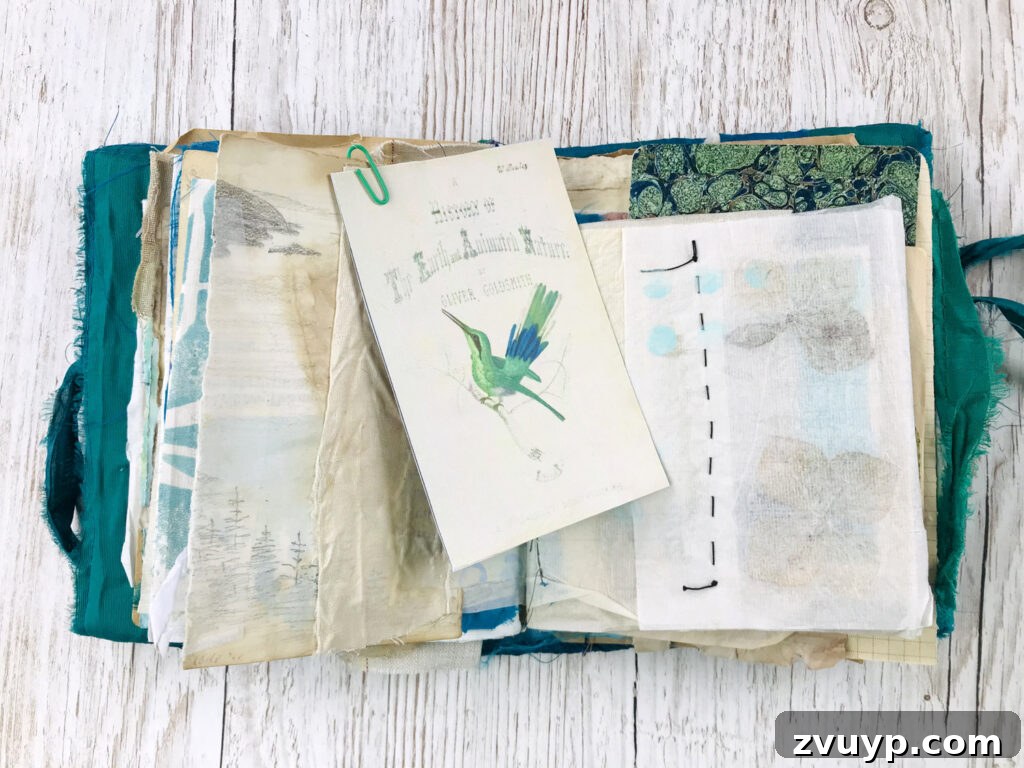 Jane Chipp's Gilded Peacock Junk Journal 5 Junk journal page featuring a bird illustration and mixed media