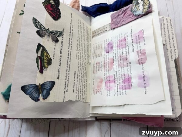 Ingrid Carlsen's Petal & Sip Junk Journal 12 Junk journal spread featuring elegant pink watercolor swatches, whimsical butterflies, and layered vintage papers