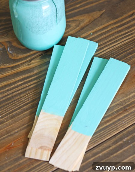 Painted stakes for DIY Ring Toss