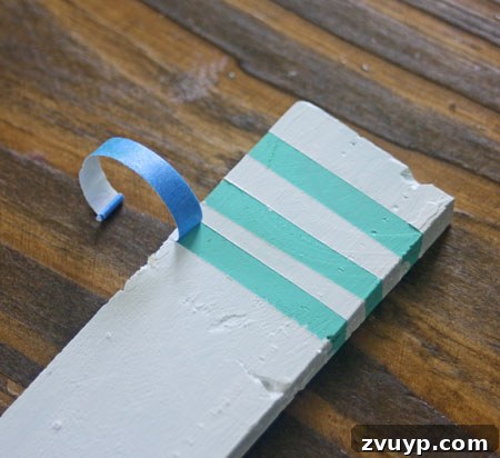 Build Your Own Ring Toss Game 9 Peeling off tape from Wood Shim Project