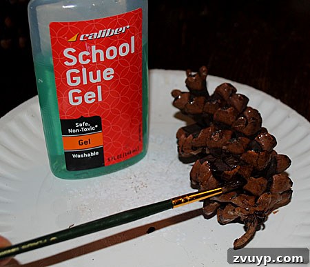 Craft Your Own Pinecone Ornaments 2 Applying Glue to Pinecone Scales