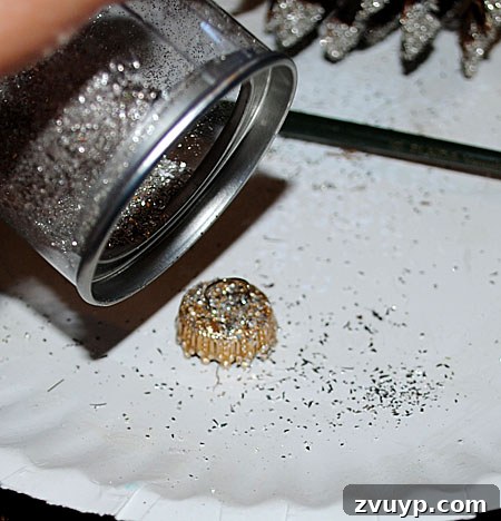 Craft Your Own Pinecone Ornaments 8 Adding Glitter to the Glued Ornament Cap