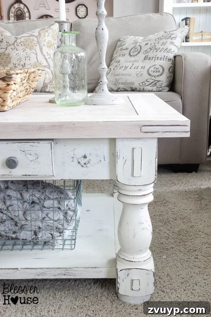 Farmhouse Whitewash Coffee Table 8 Chippy White Lime Finished Coffee Table styled in a farmhouse living room, showcasing its blend of rustic charm and elegant design, acting as a centerpiece. | Bless'er House