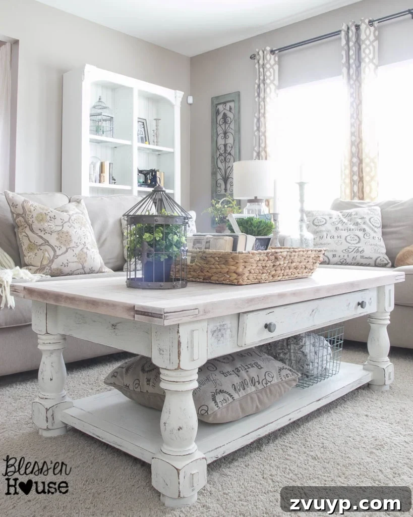Farmhouse Whitewash Coffee Table 9 Another view of the styled Chippy White Lime Finished Coffee Table, emphasizing its inviting and textured look, perfect for a cozy atmosphere. | Bless'er House