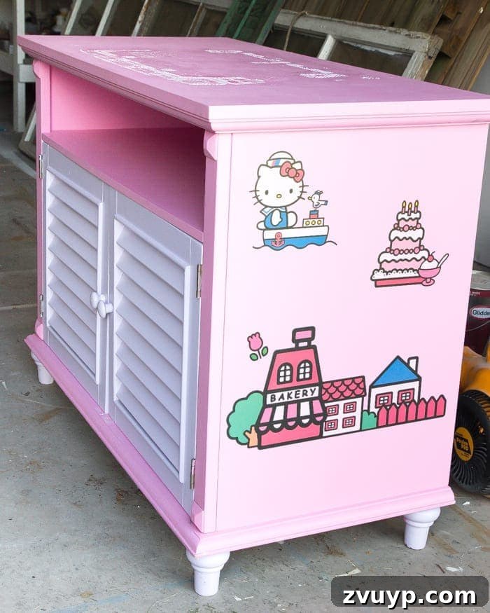 Thrift Like a Pro: Goodwill's Best Kept Secrets 8 Before image of a pink cabinet with stickers, showing its initial condition.