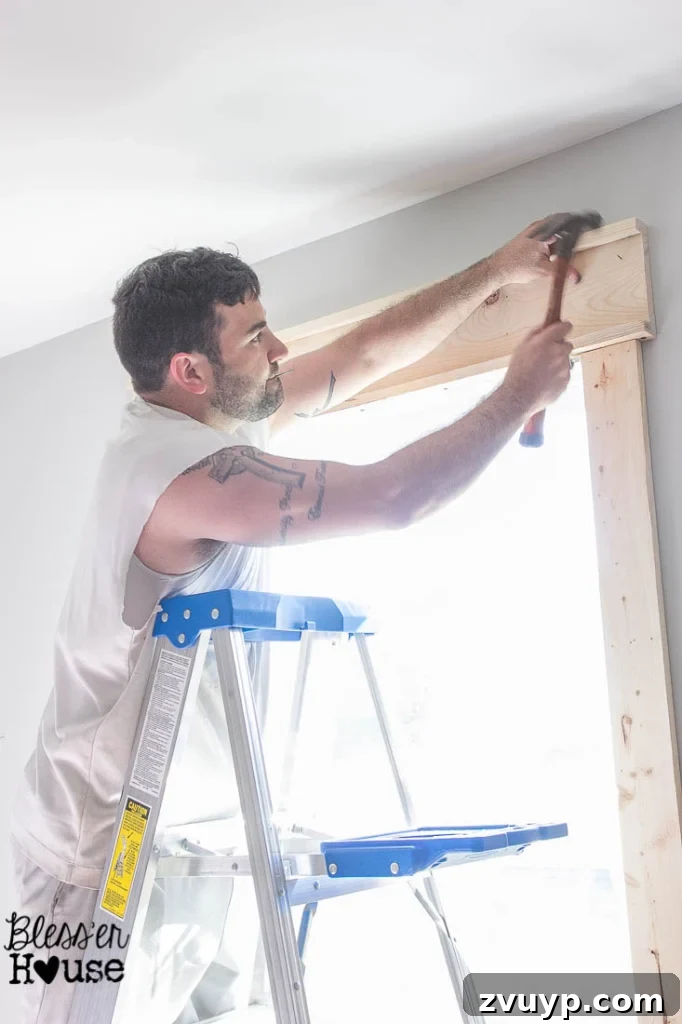 Easy Window Trim Installation: Skip the Miter Saw 9 making a header with 1x2 boards and 1x6 boards for easy interior window trim without miter cuts as window casing