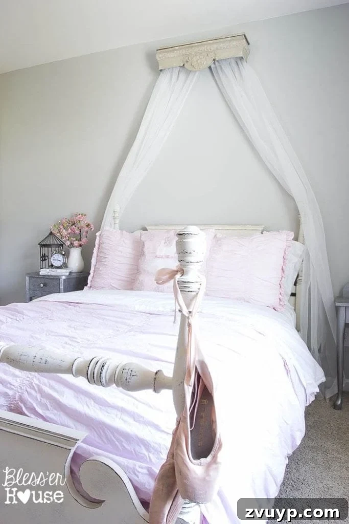 Dreamy Bed Canopy Crown from an Upcycled Shelf 8 DIY Canopy Crown from a Repurposed Shelf: A view of Olivia's bed and the window with the new curtains, illustrating the cohesive design of her transformed bedroom.