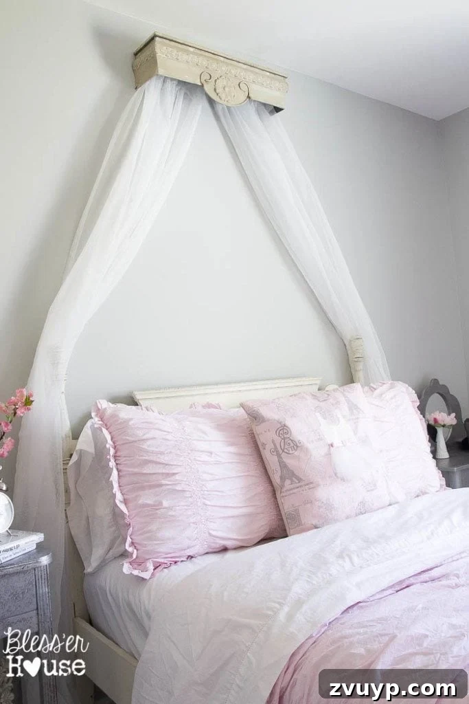 Dreamy Bed Canopy Crown from an Upcycled Shelf 9 DIY Canopy Crown from a Repurposed Shelf: A wider shot of Olivia's room, showing the window, bed, and the space above the headboard, awaiting a new decorative piece.