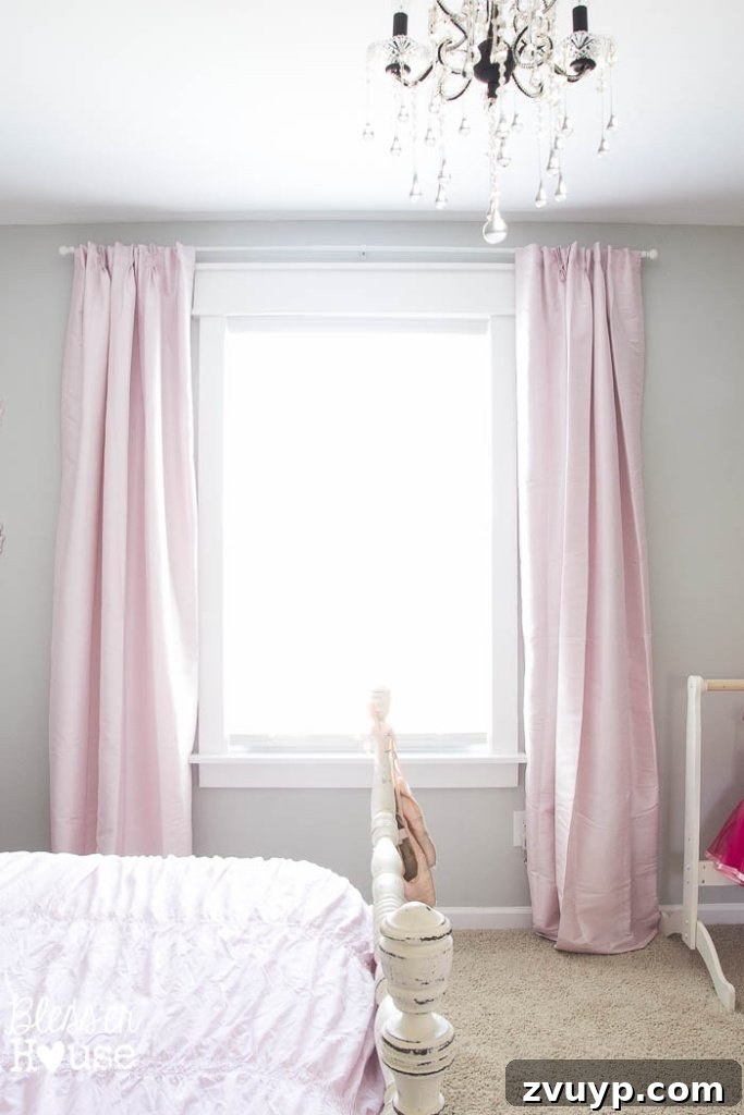 Dreamy Bed Canopy Crown from an Upcycled Shelf 10 DIY Canopy Crown from a Repurposed Shelf: Full view of Olivia's window after DIY molding and new curtains, making the space appear larger and more inviting.