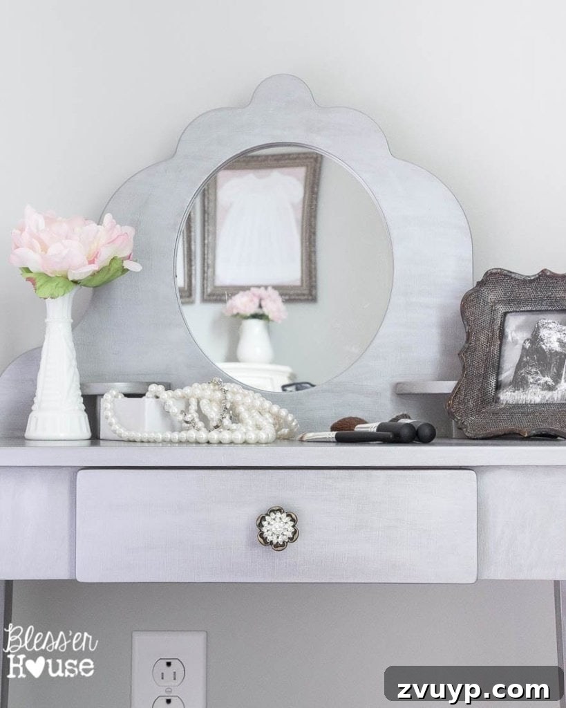 En Pointe Perfection: Her Ballerina Bedroom Makeover 15 Gilded child's play vanity with accessories, a charming detail in a ballerina girl's bedroom.