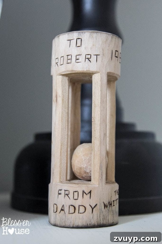 En Pointe Perfection: Her Ballerina Bedroom Makeover 21 Hand-whittled wooden rattle, a special family heirloom on Olivia's dresser in her charming bedroom.