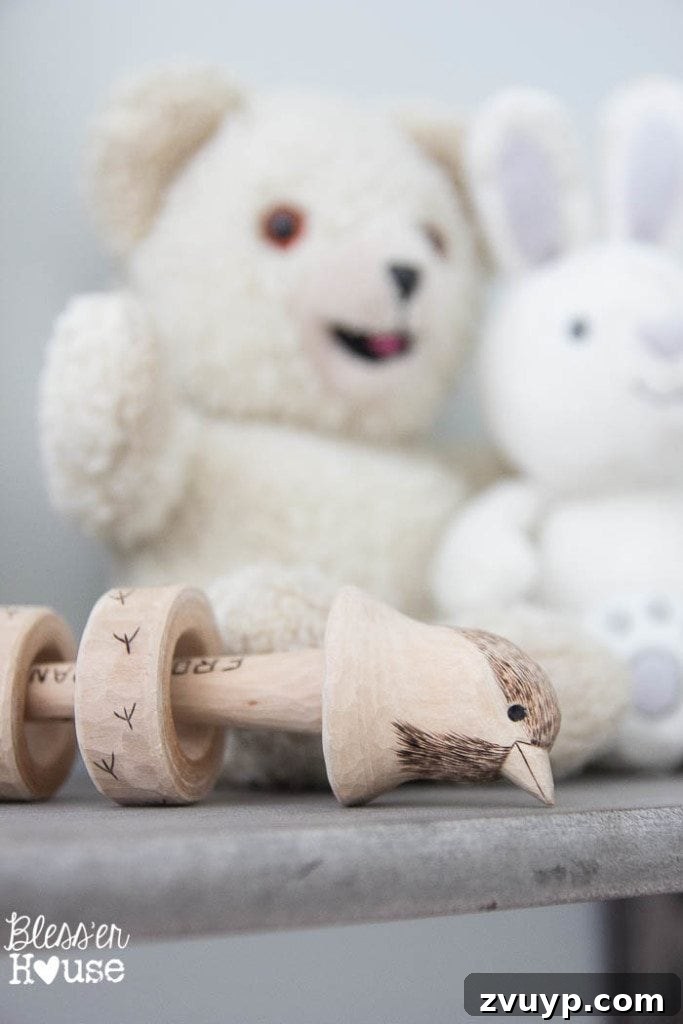 En Pointe Perfection: Her Ballerina Bedroom Makeover 24 Hand-whittled bird rattle for Olivia, a precious family heirloom and unique decor piece in her room.