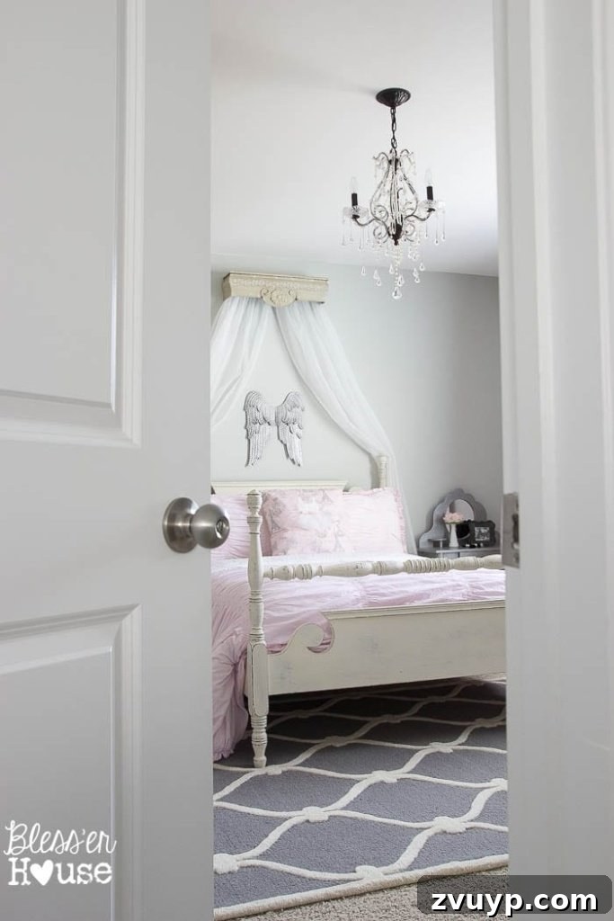En Pointe Perfection: Her Ballerina Bedroom Makeover 5 After: Stunning Ballerina Girl Bedroom Makeover with pink, white, and grey tones, featuring a DIY ballet barre.