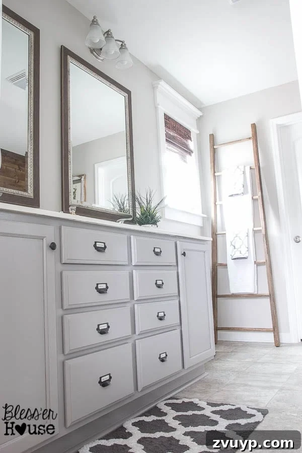 Effortless Cabinet Transformation for Beginners 4 Close-up of a rustic industrial bathroom vanity with original cherry wood cabinets.