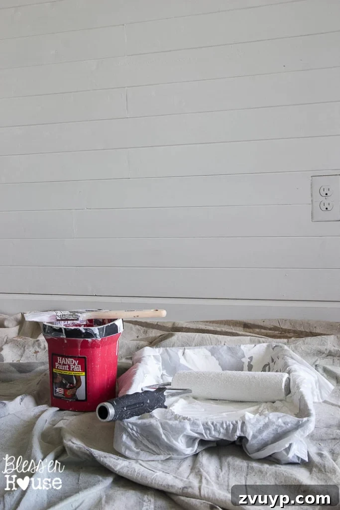 DIY Faux Shiplap Wall for Instant Farmhouse Charm 14 Painting DIY faux shiplap wall