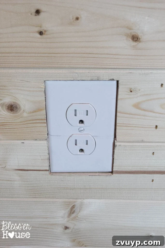 DIY Faux Shiplap Wall for Instant Farmhouse Charm 8 Cutting around an outlet for shiplap