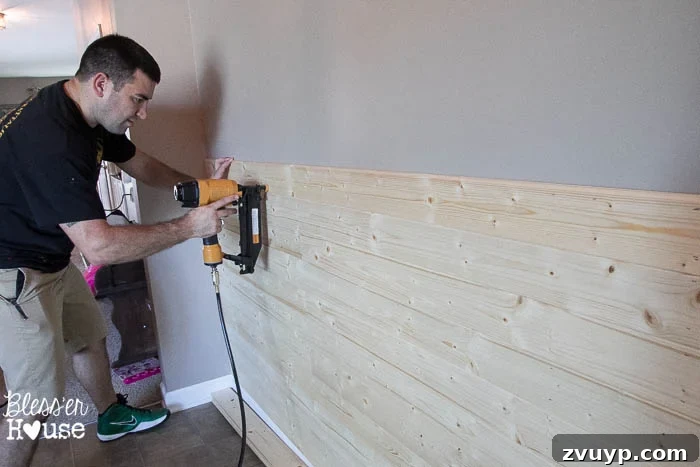 DIY Faux Shiplap Wall for Instant Farmhouse Charm 9 Staggering shiplap plank lengths