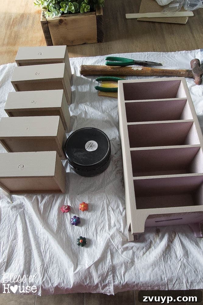 Industrial Workstation Hub 4 Applying Annie Sloan Chalk Paint in Coco to the old jewelry box for an industrial office organizer makeover.