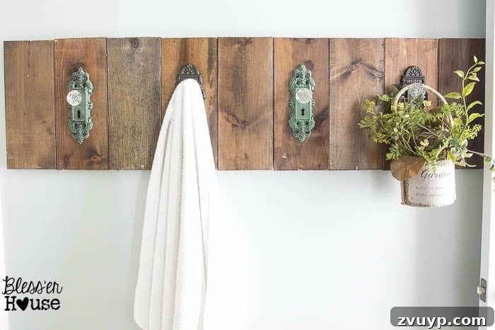Upcycled Door Knob Towel Hooks 11 DIY Antique Door Knob Towel Rack | Bless'er House: A close-up showing the rustic texture and minor imperfections of the reclaimed wood planks.