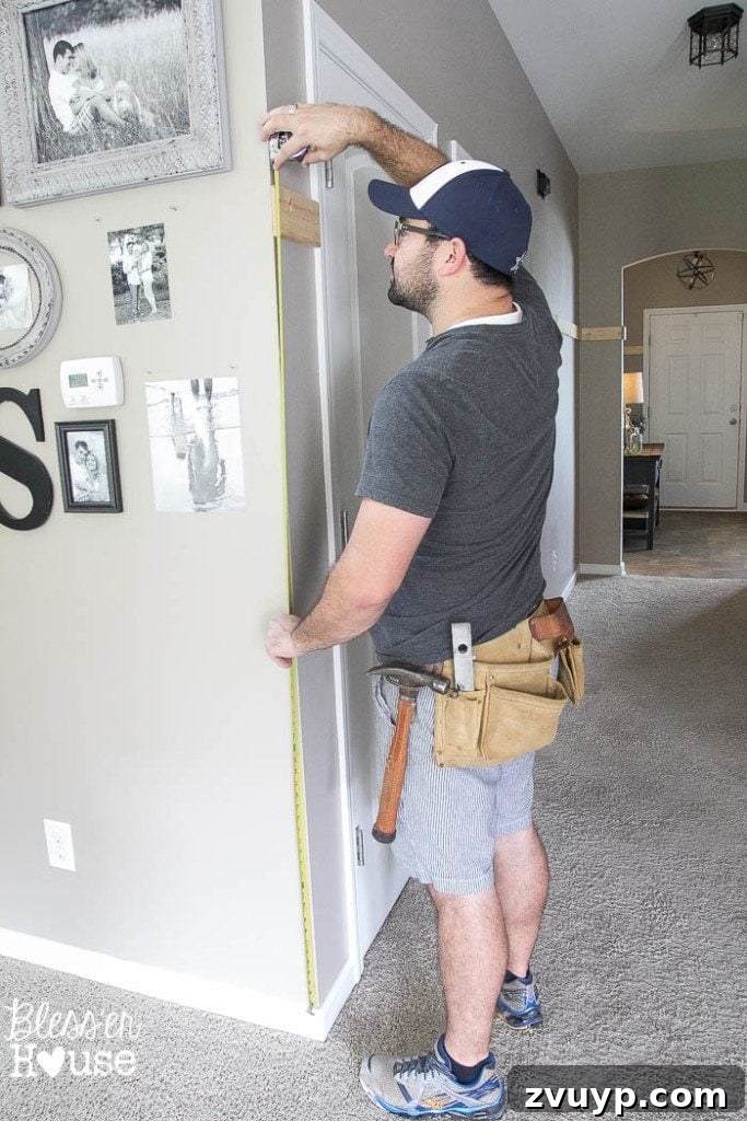 Effortless & Affordable Board and Batten DIY 13 Measuring the height for vertical battens for board and batten wainscoting