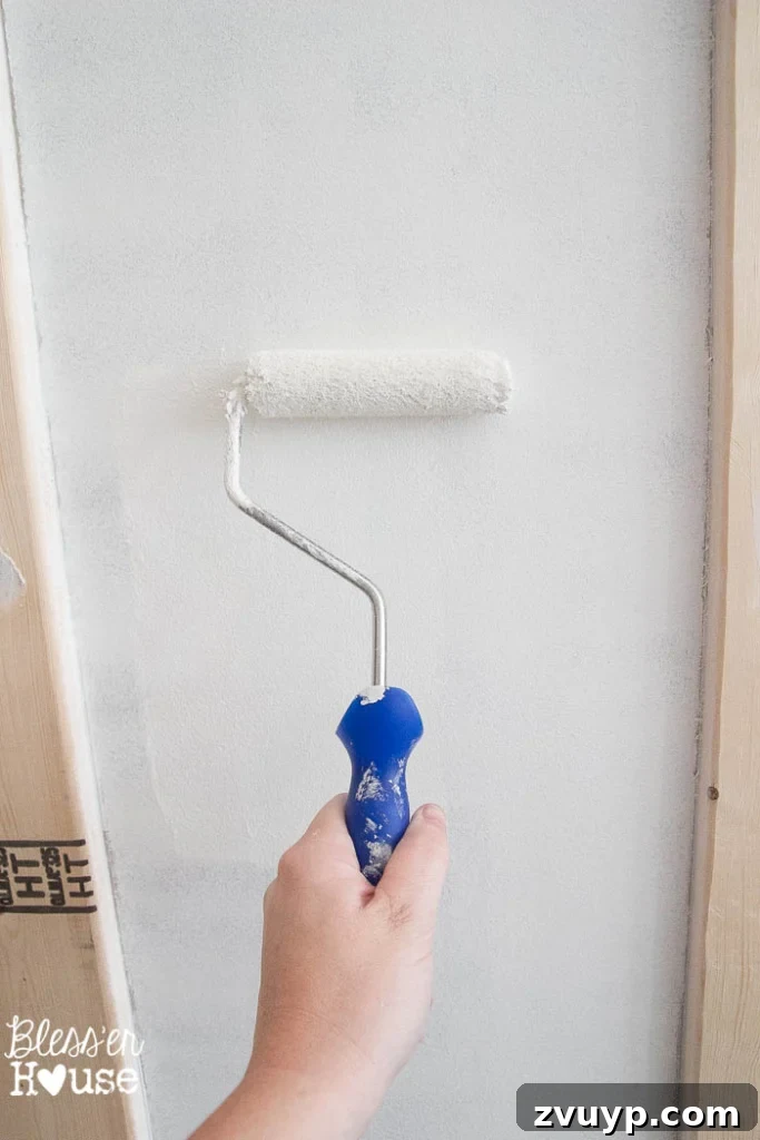 Our DIY Board and Batten Makeover A Glidden Paint Review 13 DIY Board and Batten for Under $100 | Bless'er House