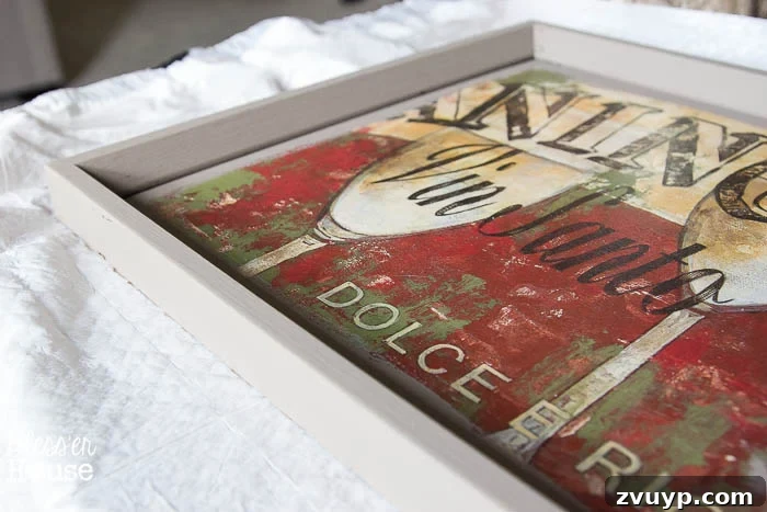 Transforming Old Art into Personalized Text Decor 4 Applying Annie Sloan Chalk Paint in Coco to old art frames