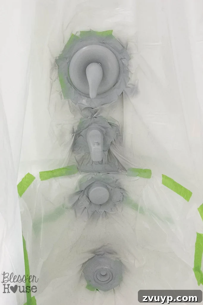Transform Your Bathroom Fixtures with Spray Paint 12 spray painted shower fixtures