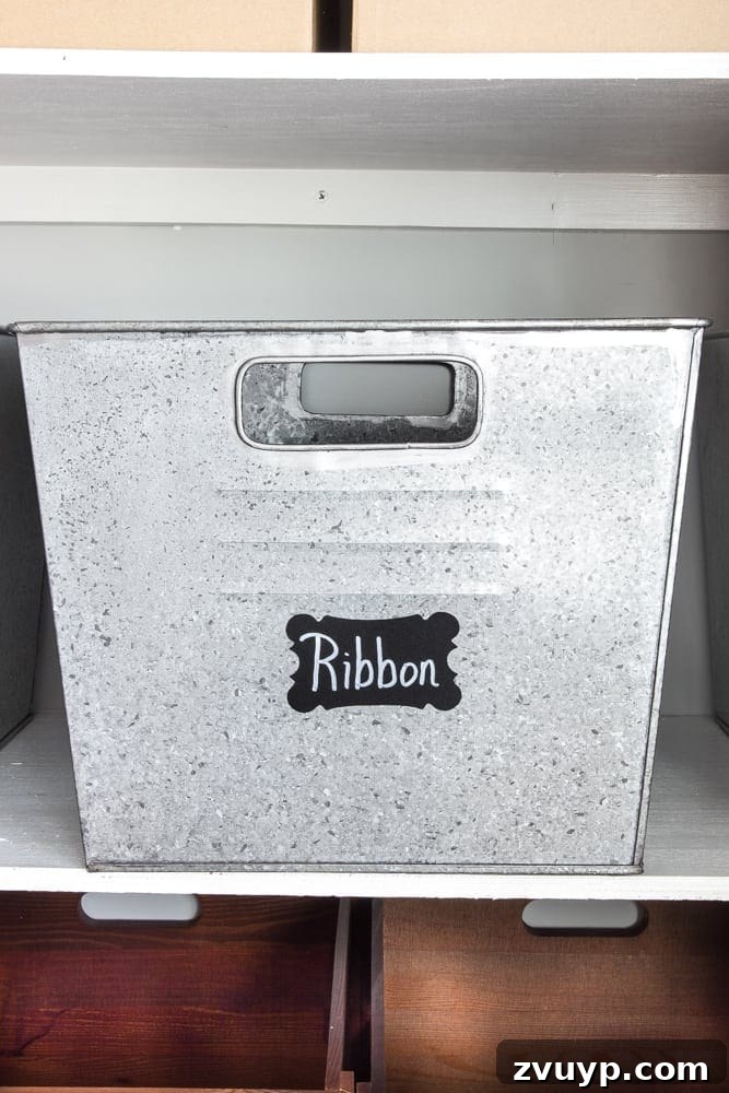 Your Ultimate Craft Closet Makeover 10 Chalkboard labels on craft storage bins for clear and customizable organization.