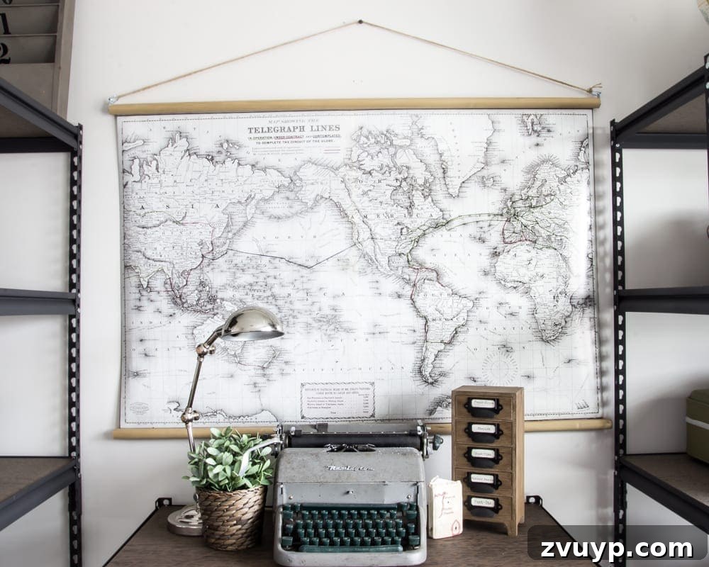 DIY Vintage Scroll Map 6 Finished DIY Vintage Pull-Down Map in Home Office | Showcase your handmade vintage-style map as the perfect decor piece in your office. Adds a worldly and sophisticated touch, creating a focal point for your workspace.