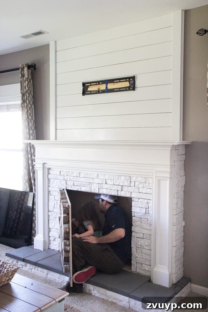 My Faux Fireplace DIY Glow Up 3 DIY Faux Fireplace Updated | blesserhouse.com - This fireplace looks so real and it cost about $600 to build!