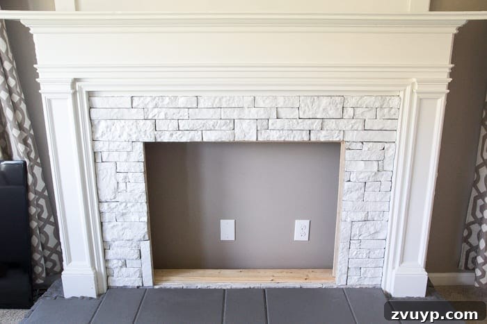 My Faux Fireplace DIY Glow Up 5 DIY Faux Fireplace Updated | blesserhouse.com - This fireplace looks so real and it cost about $600 to build!