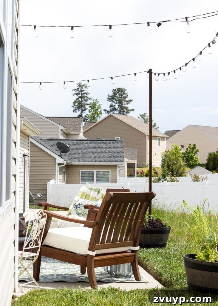 Transform Your Tiny Patio into an Outdoor Oasis 14 How to Decorate a Small Patio | blesserhouse.com - Utilize a small patio space with chairs at each corner and a fire pit in the middle for function and entertainment. Add outdoor string lights for a cozy ambience.