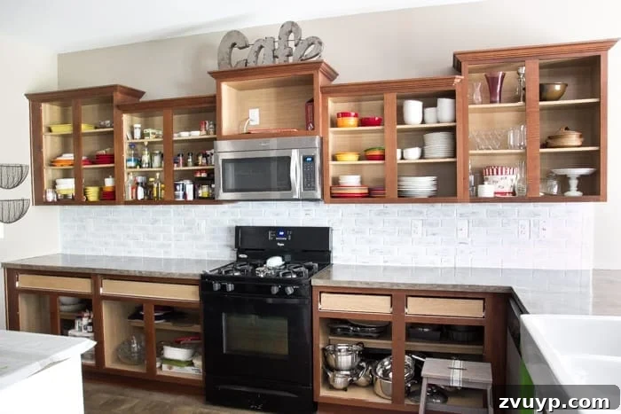 Flawless Cabinets: Paint Your Kitchen Like a Seasoned Pro 4 Labeled kitchen cabinet doors before painting, showing a systematic approach to organization. DIY kitchen cabinet painting tutorial for a durable finish.