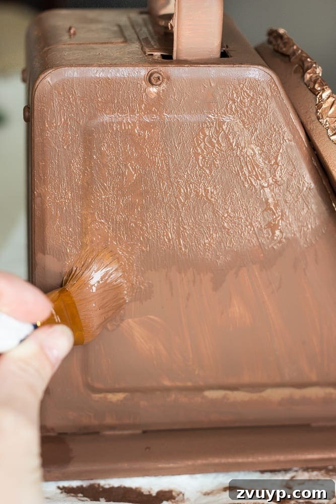 Rustic Revival: Faux Rust Vintage Scale 7 Faux Rusted Vintage Scale Makeover: Pouncing the brush to create textured rust effects.