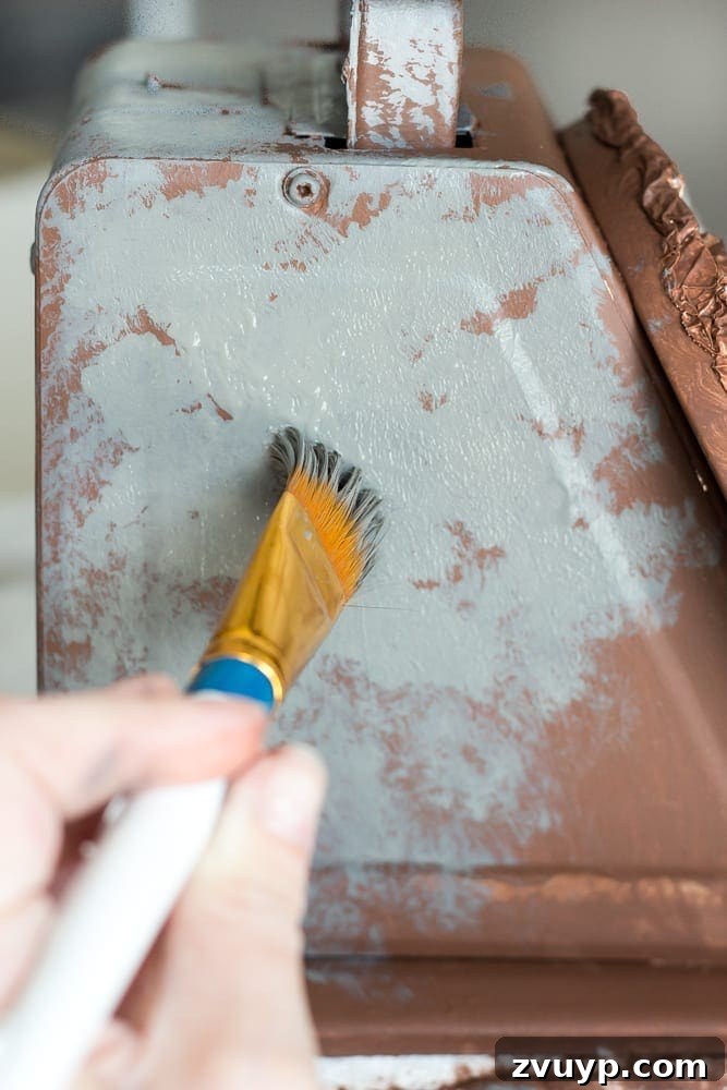 Rustic Revival: Faux Rust Vintage Scale 8 Faux Rusted Vintage Scale Makeover: Layering gray paint, allowing brown to show through for depth.