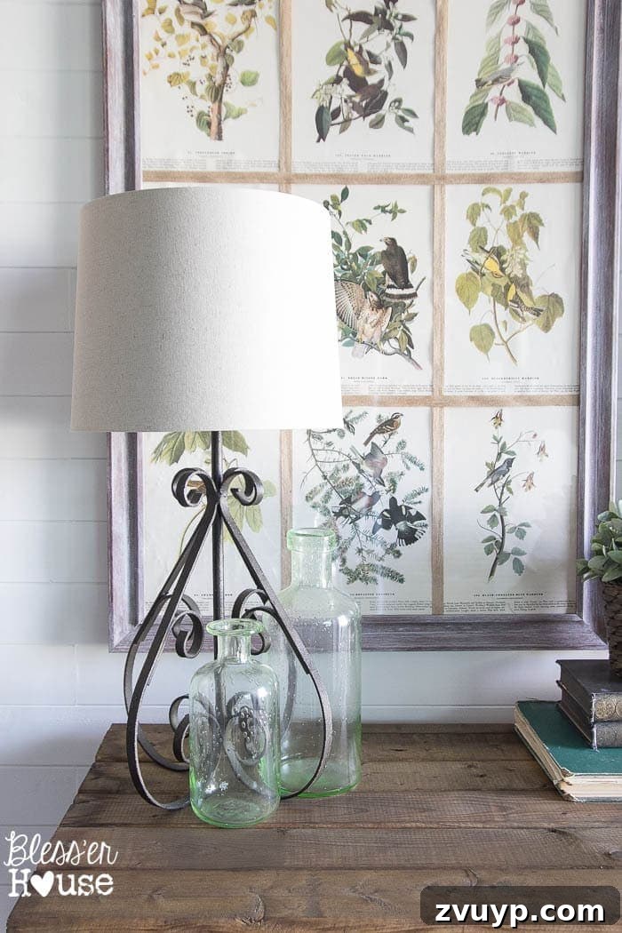 Dont Miss These 10 Thrift Store Gems 8 Beautiful thrifted scroll lamp illuminating a stylish foyer space