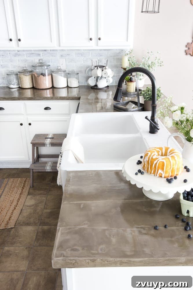 Our Stunning Modern Farmhouse Kitchen Transformation 12 Another perspective of the transformed kitchen, emphasizing the brightness and open feel achieved through strategic DIY projects.