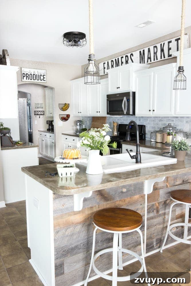 Our Stunning Modern Farmhouse Kitchen Transformation 15 The DIY Farmers Market sign, crafted from scrap wood, filling the space above the cabinets and adding farmhouse charm.