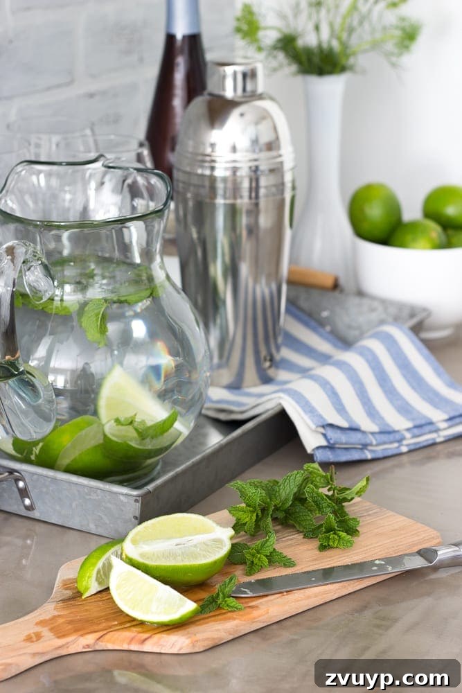 Our Stunning Modern Farmhouse Kitchen Transformation 19 The charming drink station beside the fridge, set up for summer entertaining with fresh mint for mojitos.