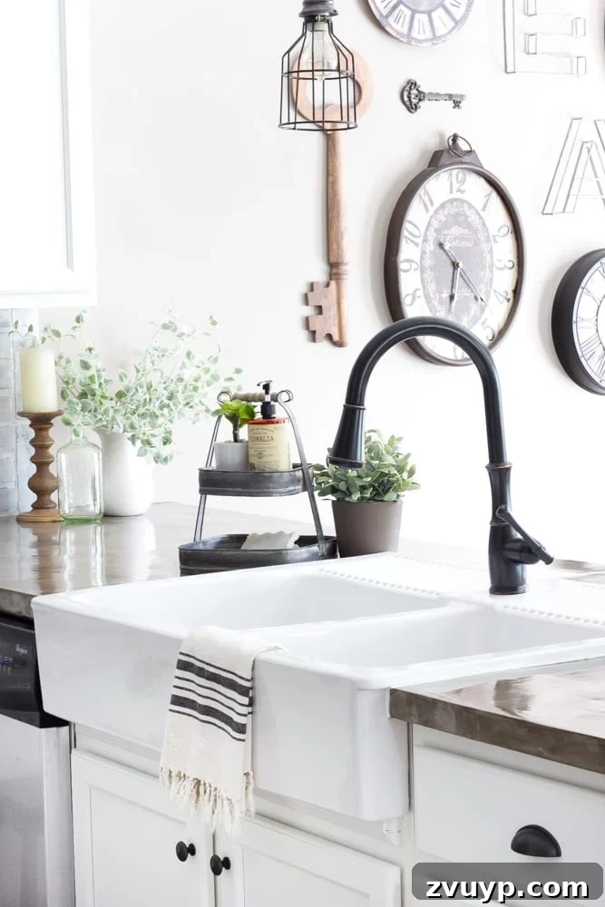 Our Stunning Modern Farmhouse Kitchen Transformation 6 The stunning new farmhouse sink and elegant faucet, showcasing the improved functionality and aesthetic appeal of the upgraded washing area.