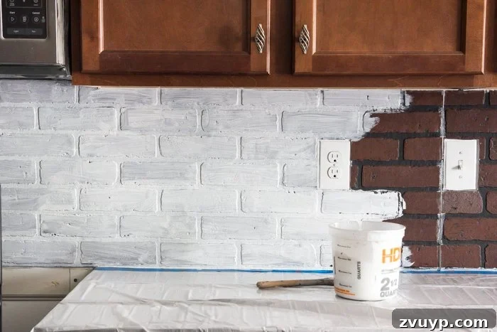 Rustic Chic Whitewashed Faux Brick Backsplash DIY 13 whitewashing paneling for a faux brick backsplash