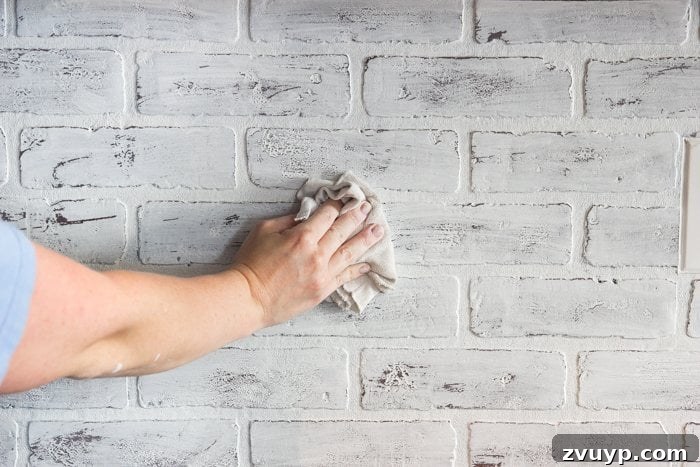 Rustic Chic Whitewashed Faux Brick Backsplash DIY 15 distressing whitewash on a faux brick backsplash for a weathered look