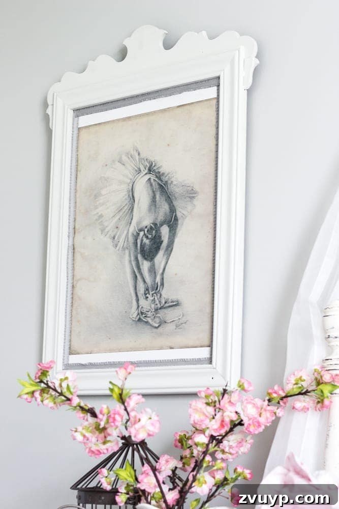 Mirror Frames Reborn as Photo Displays 10 Completed repurposed mirror picture frame with ballerina art and gray ribbon