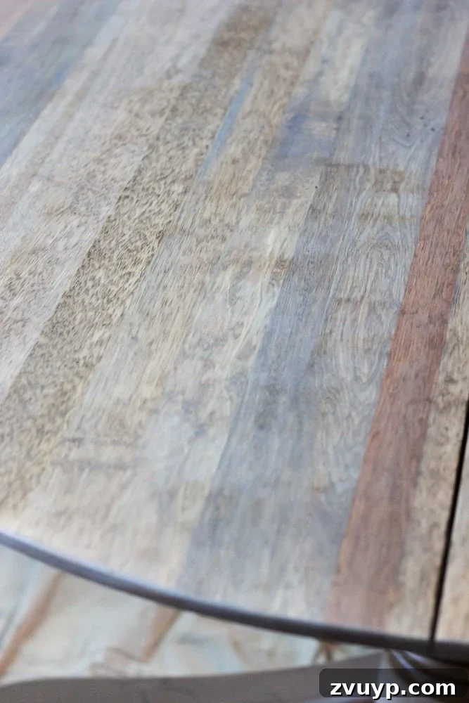 Weathered Oak's Elegant Rebirth 7 Close-up of the beautiful weathered oak wood tones on the dining table