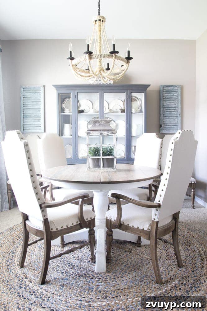 Weathered Oak's Elegant Rebirth 10 Beautifully updated dining room with weathered oak table and jute rug