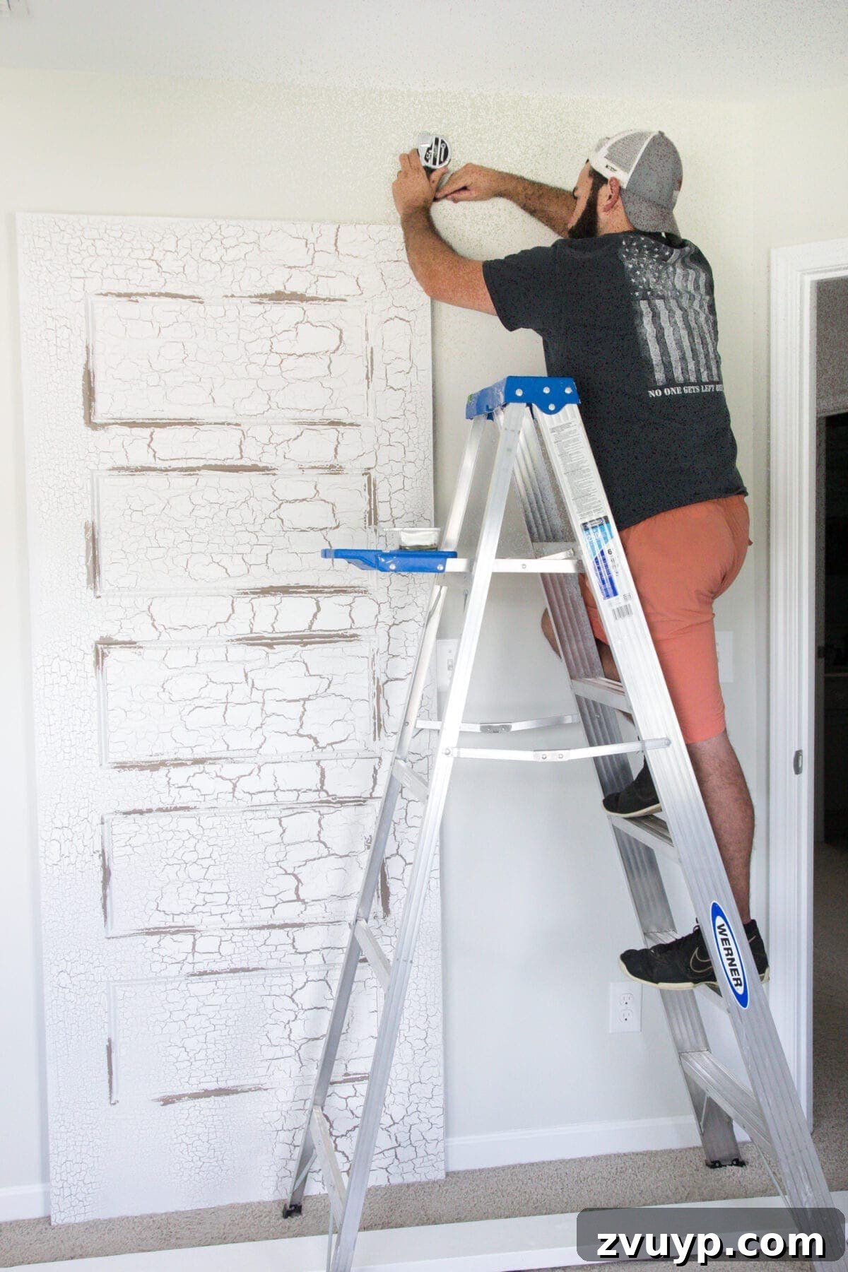 DIY Sliding Barn Door Installation Guide 5 Measurement for header board placement above the door frame.