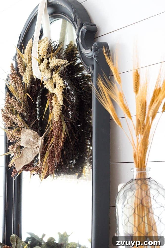 Autumn Home Decor Inspiration 27 Charcoal Mirror as a Central Element in Fall Mantel Decor