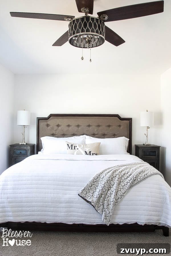 Unveiling Our Rustic Modern Sanctuary: Master Bedroom Decor & Shopping Guide 2 Before: Plain white, boring builder-grade master bedroom awaiting a rustic modern makeover